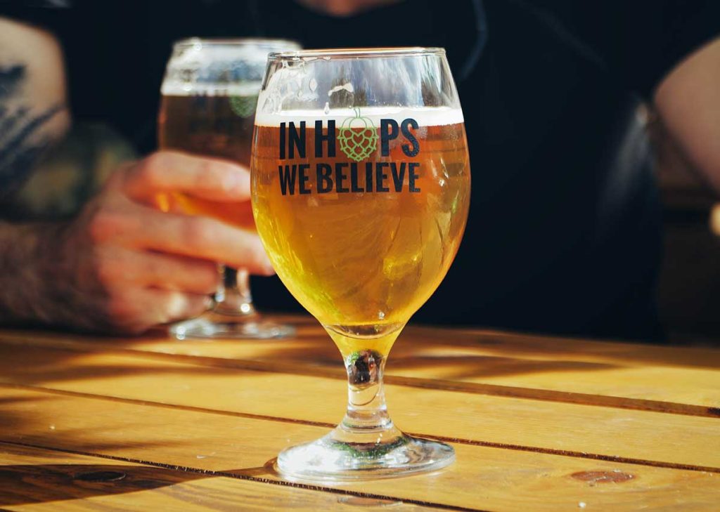 in hops we believe beer glass